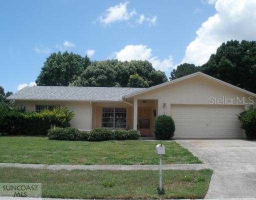 1302 Woodstock Dr., Palm Harbor, FL 34684