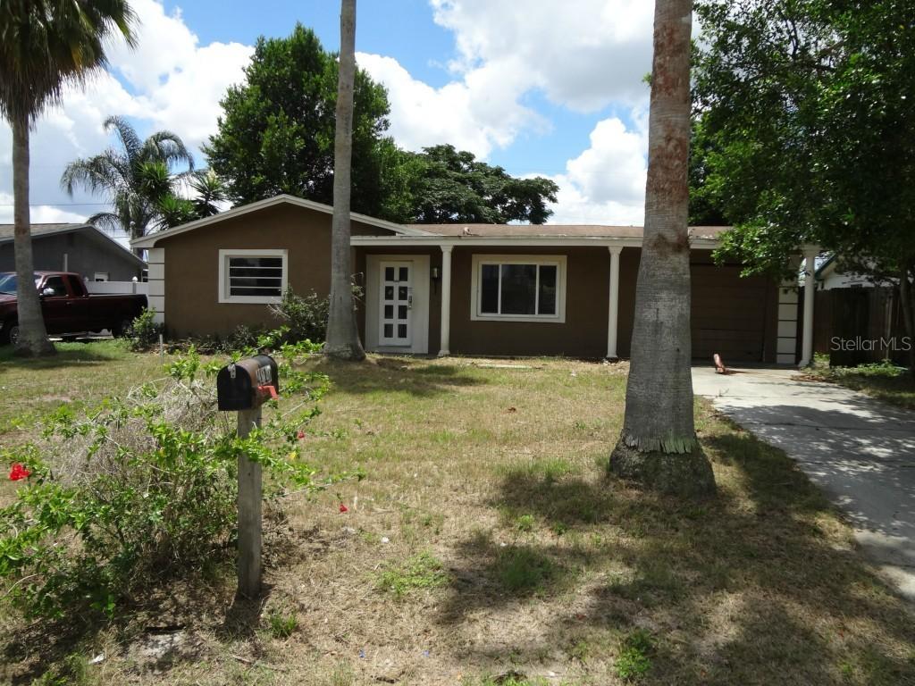 4110 Woodfield Ave., Holiday, FL 34691