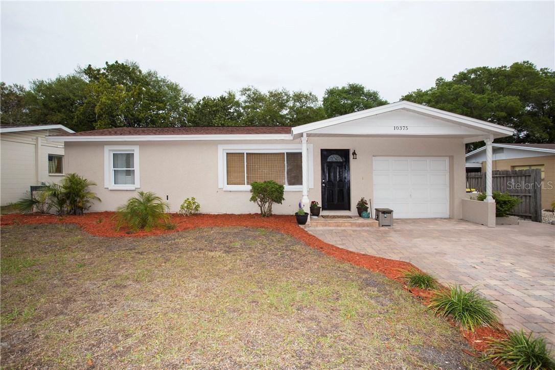 10375 Cirimoya Ln., Seminole, FL 33772