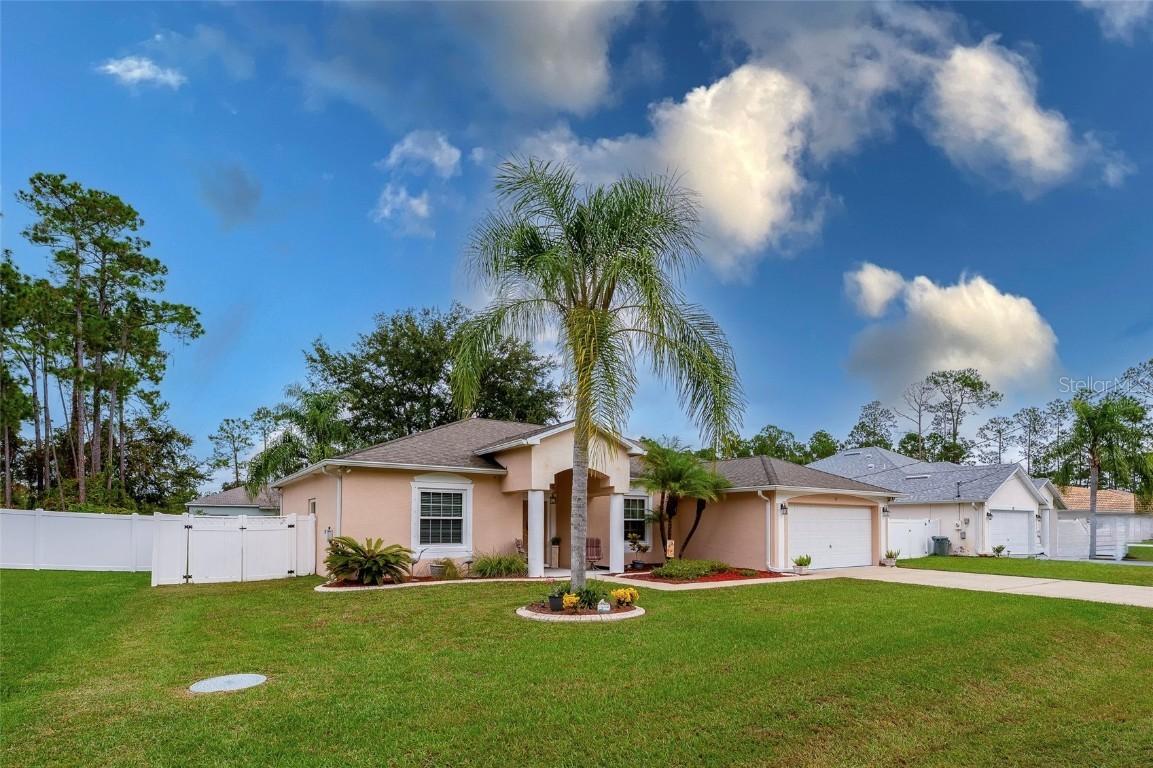 37 Point Of Woods Dr., Palm Coast, FL 32164