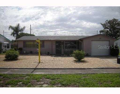 1148 Tamarac Dr., Holiday, FL 34690