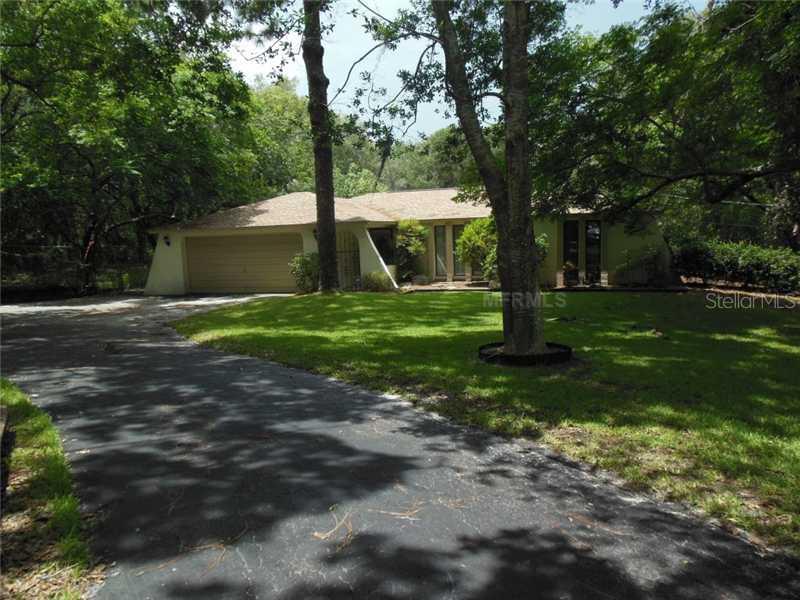 9323 Tree Top Ln., Hudson, FL 34669