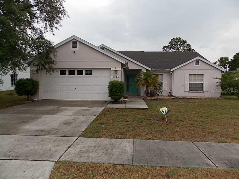 10244 Rainbow Oaks Dr., Hudson, FL 34667
