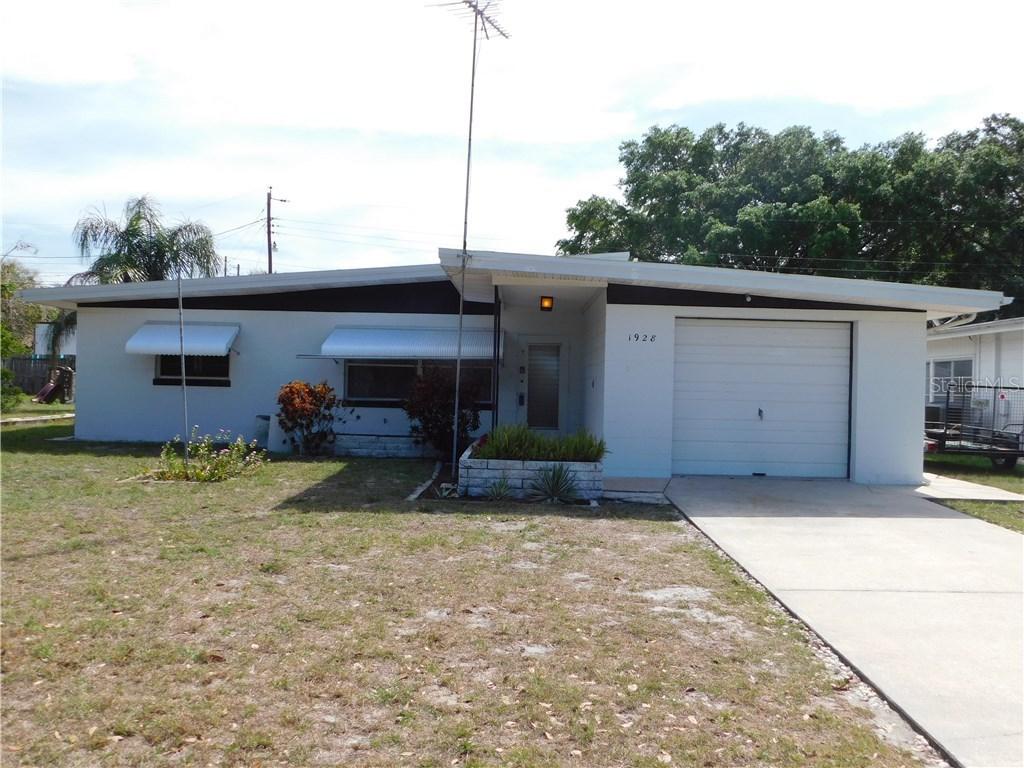 1928 Hacienda Way, Holiday, FL 34690