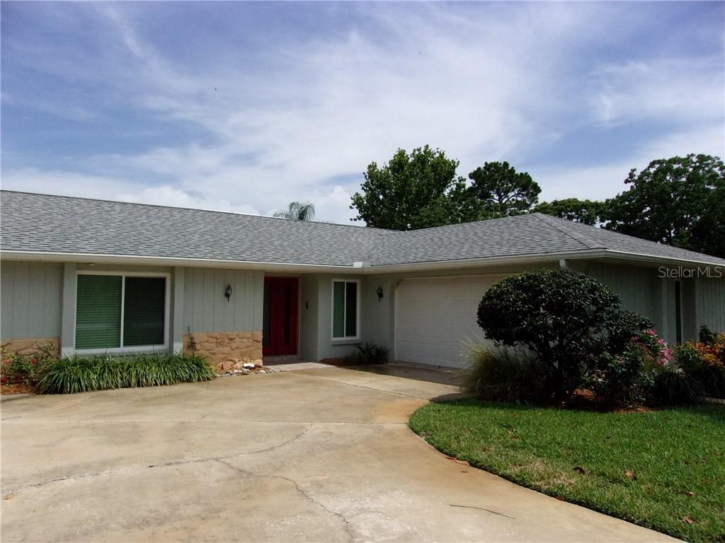 7712 Lakeside Woodlands Dr., Hudson, FL 34667